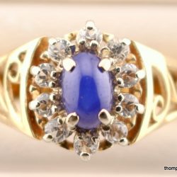 10-14k yellow gold white stone & blue star sapphire ring